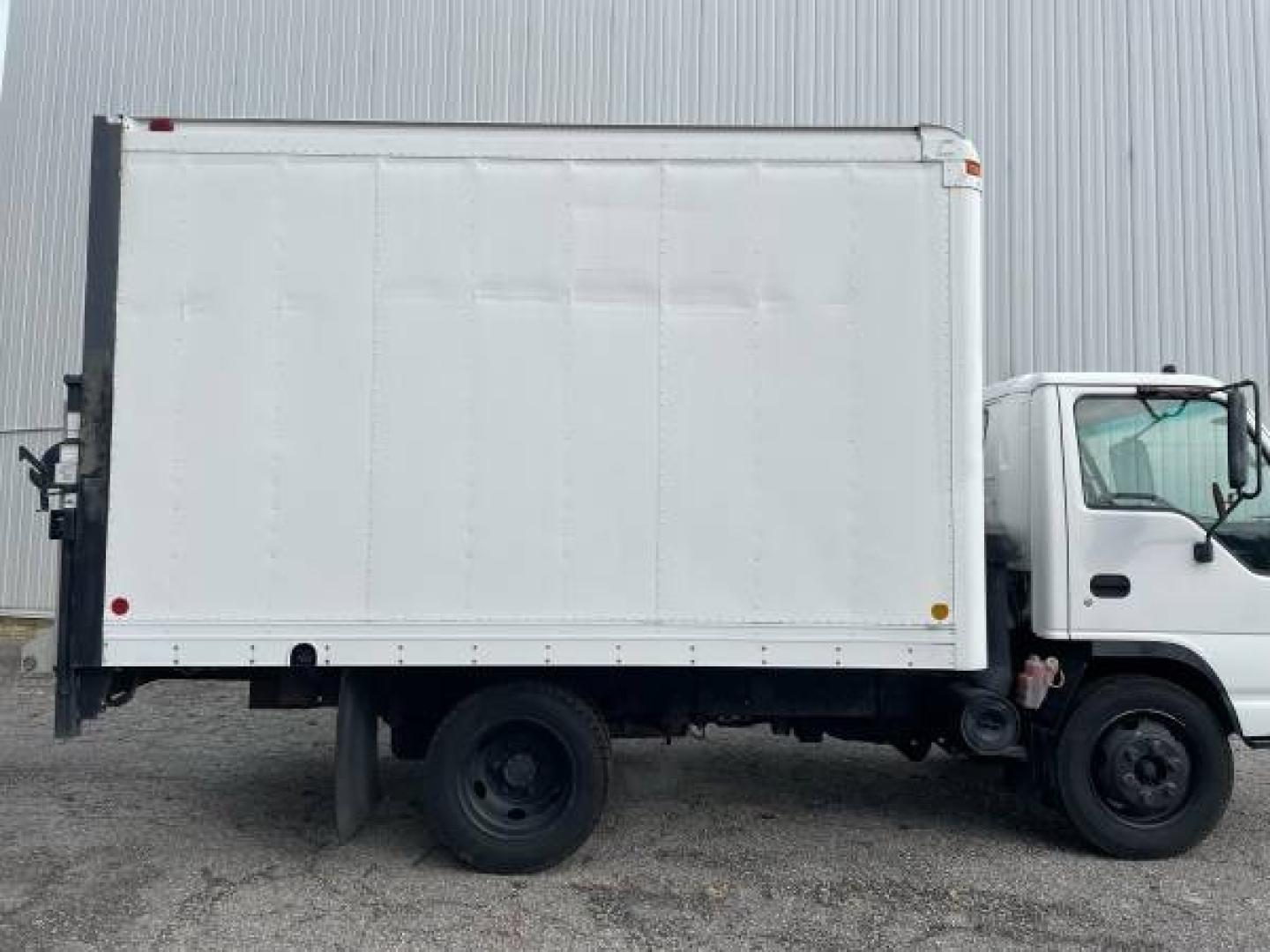 1999 white /gray Isuzu NPR (4KLC4B1R8XJ) with an 5.7 GAS V8 engine, Auto transmission, located at 5700 Curlew Drive, Norfolk, VA, 23502, (757) 455-6330, 36.841885, -76.209412 - -1999 Isuzu NPR 61k -Ready to work! -V8 gas motor -6 like new tires with great tread -12 ft box with roll up door -Tommy gate has been removed -No issues, runs and drives great -New state inspection -VADLR $250 processing fee. No other dealer fees. - Photo#11